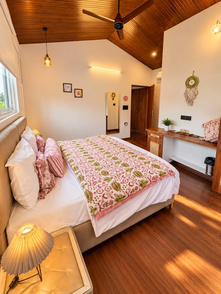 Musk Rose · Second bedroom with warm wood ceiling