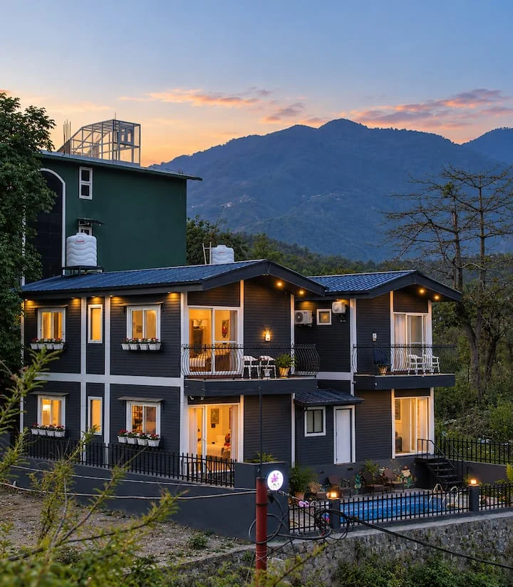Musk Rose · Exterior and mountain backdrop at sunset